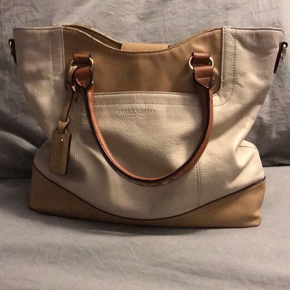 Tignanello leather cream and tan purse.